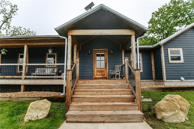 view of front of home featuring covered porch