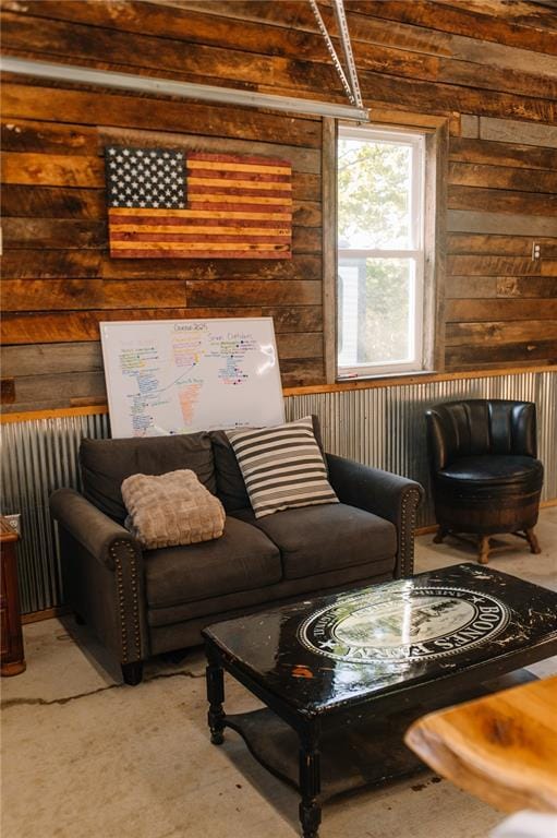 living room with wood walls