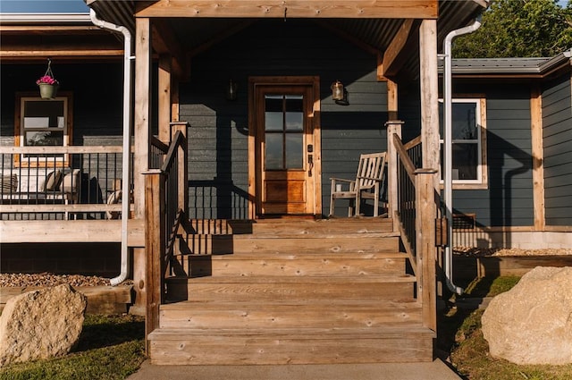 entrance to property with covered porch