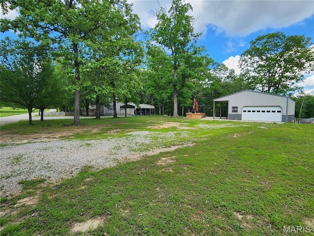 342 Deer Run Acres A, Williamsville, MO 63967 - view of green lawn with a garage and an outdoor structure