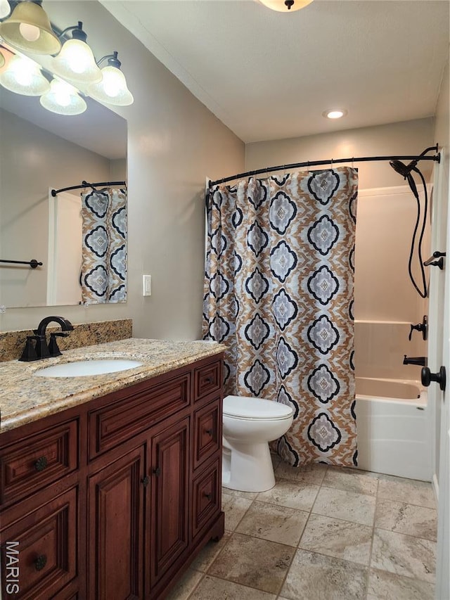 342 Deer Run Acres A, Williamsville, MO 63967 - full bathroom featuring vanity, toilet, shower / bath combo with shower curtain, stone tile flooring, and recessed lighting