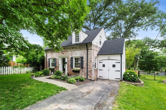 301 Dawson Ct, Webster Groves, MO 63119 - view of front facade with driveway, an attached garage, brick siding, and a shingled roof