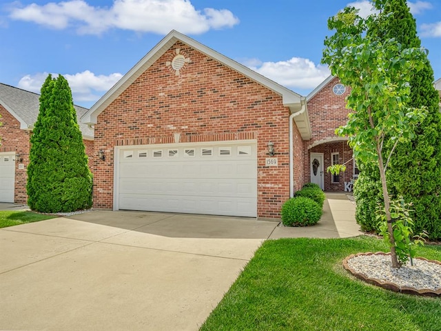 1569 Ghent Rd, Columbia, IL 62236 - traditional home with driveway, a garage, and brick siding