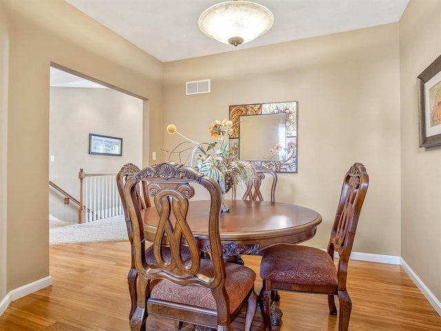 1569 Ghent Rd, Columbia, IL 62236 - dining area with light wood finished floors and baseboards