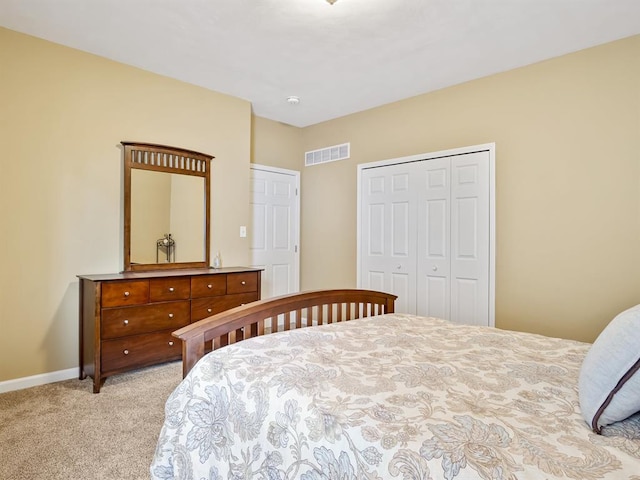 1569 Ghent Rd, Columbia, IL 62236 - bedroom featuring light carpet, a closet, and baseboards