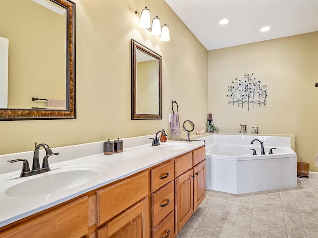 1569 Ghent Rd, Columbia, IL 62236 - bathroom with a bath, double vanity, and recessed lighting