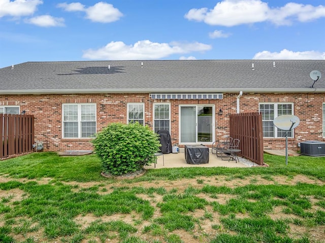 1569 Ghent Rd, Columbia, IL 62236 - back of property featuring a patio area, brick siding, roof with shingles, and cooling unit