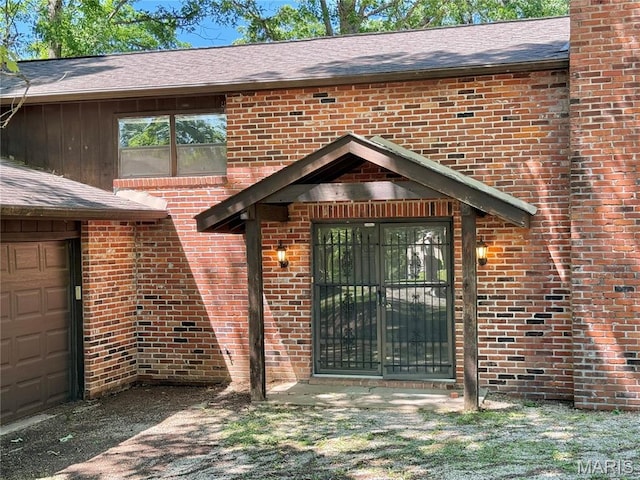 8305 Brouk Dr, Cedar Hill, MO 63016 - view of exterior entry with brick siding