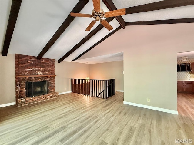 8305 Brouk Dr, Cedar Hill, MO 63016 - unfurnished living room featuring wood finished floors, ceiling fan, a fireplace, and baseboards