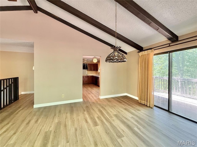 8305 Brouk Dr, Cedar Hill, MO 63016 - unfurnished room featuring wood finished floors, baseboards, and a textured ceiling
