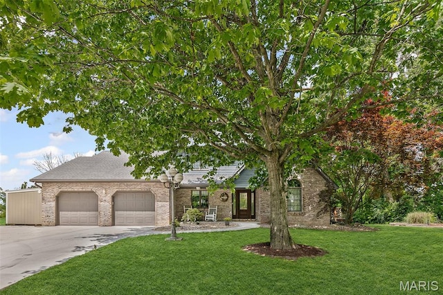 7 Tall Oaks Dr, Troy, IL 62294 - obstructed view of property with a garage, a front lawn, concrete driveway, and brick siding