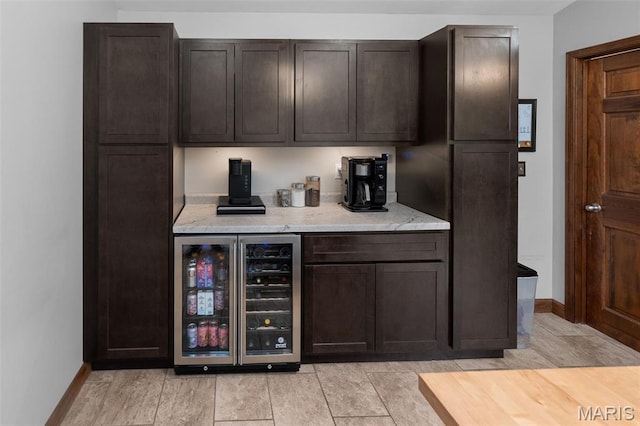 7 Tall Oaks Dr, Troy, IL 62294 - indoor dry bar featuring beverage cooler and baseboards