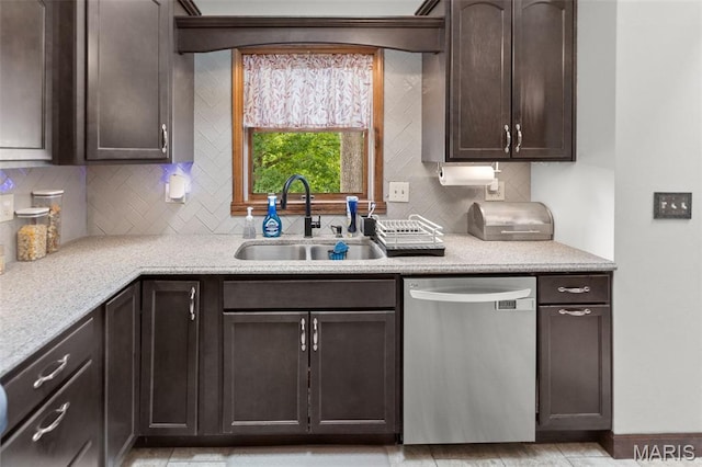 7 Tall Oaks Dr, Troy, IL 62294 - kitchen with dishwasher, dark brown cabinets, tasteful backsplash, and light stone counters