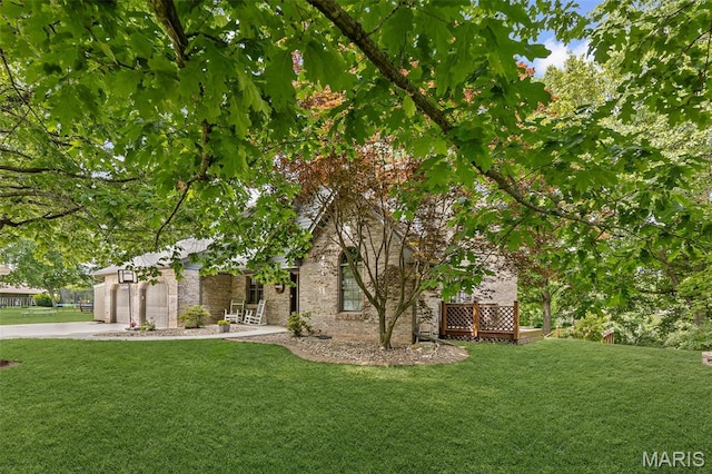 7 Tall Oaks Dr, Troy, IL 62294 - view of front facade featuring a front yard, driveway, brick siding, and a garage