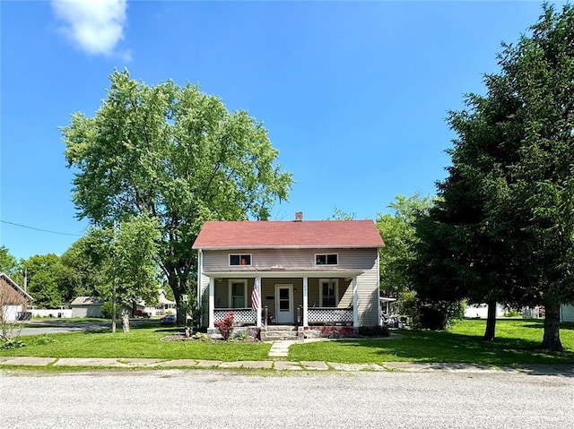 201 E 2nd N St, Mount Olive, IL 62069 - view of front of property featuring a porch and a front yard