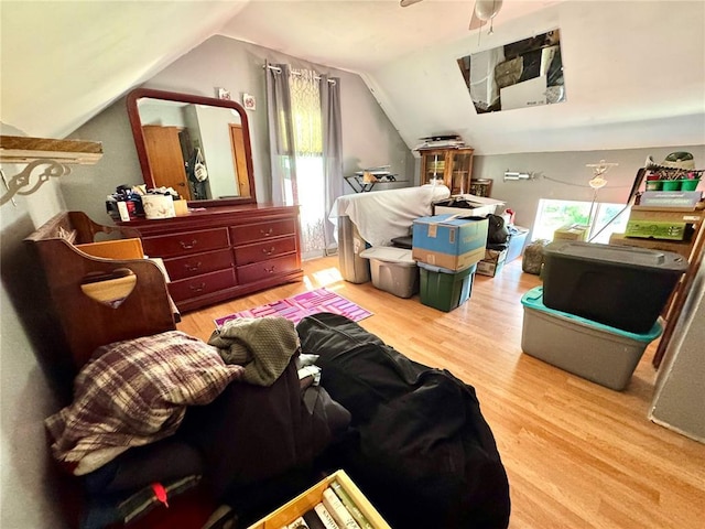 201 E 2nd N St, Mount Olive, IL 62069 - bedroom featuring multiple windows, wood finished floors, and lofted ceiling