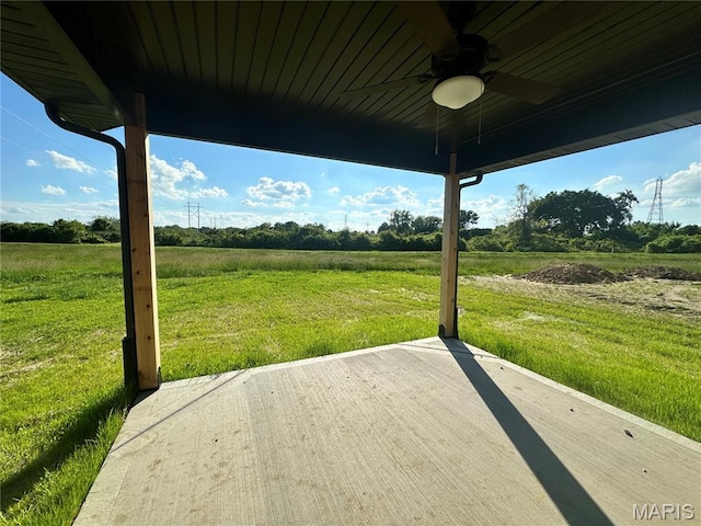 2805 Beth Ann Ct, Pontoon Beach, IL 62040 - wooden deck featuring a view of countryside, ceiling fan, a patio, and a lawn