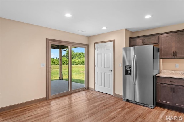 2805 Beth Ann Ct, Pontoon Beach, IL 62040 - kitchen featuring stainless steel fridge, light wood-type flooring, dark brown cabinets, baseboards, and recessed lighting