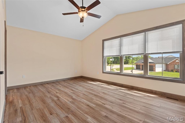 2805 Beth Ann Ct, Pontoon Beach, IL 62040 - unfurnished room with vaulted ceiling, ceiling fan, light wood finished floors, and baseboards