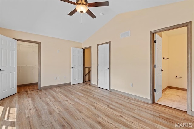 2805 Beth Ann Ct, Pontoon Beach, IL 62040 - unfurnished bedroom featuring vaulted ceiling, light wood finished floors, baseboards, ensuite bathroom, and ceiling fan