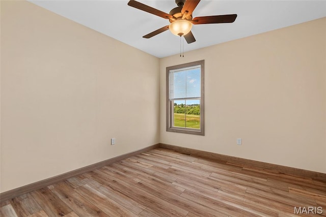 2805 Beth Ann Ct, Pontoon Beach, IL 62040 - empty room featuring light wood finished floors, ceiling fan, and baseboards