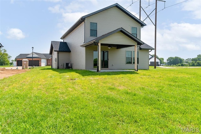 2805 Beth Ann Ct, Pontoon Beach, IL 62040 - view of front facade with central AC, ceiling fan, a front yard, and a patio area