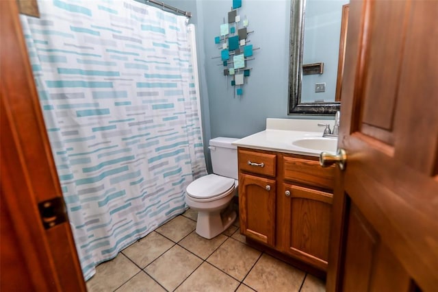 full bath with tile patterned floors, toilet, vanity, and a shower with shower curtain