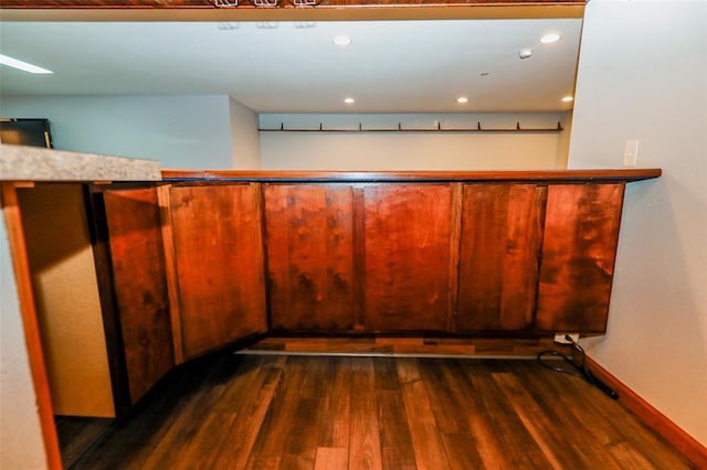 bar featuring wood finished floors and recessed lighting