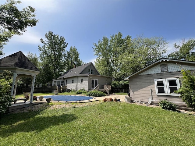 view of yard featuring a gazebo and a deck