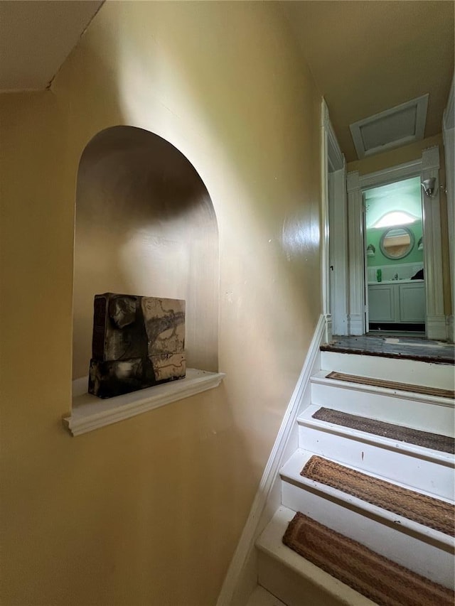 stairway with arched walkways