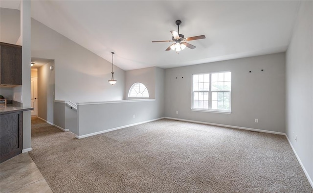 23529 Restore Rd, Waynesville, MO 65583 - empty room with ceiling fan, light carpet, baseboards, and high vaulted ceiling