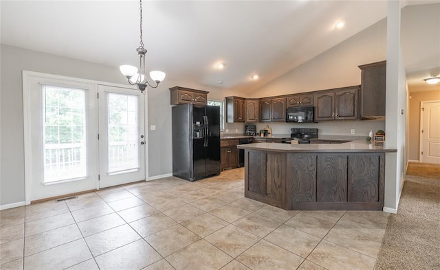 23529 Restore Rd, Waynesville, MO 65583 - kitchen featuring black appliances, dark brown cabinets, lofted ceiling, a chandelier, and a peninsula