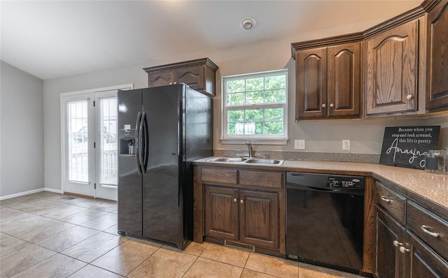 23529 Restore Rd, Waynesville, MO 65583 - kitchen featuring black appliances, a sink, light tile patterned flooring, and dark brown cabinets