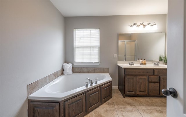 23529 Restore Rd, Waynesville, MO 65583 - bathroom with a shower stall, a garden tub, double vanity, and tile patterned flooring
