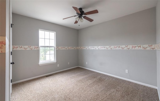 23529 Restore Rd, Waynesville, MO 65583 - carpeted spare room featuring a ceiling fan and baseboards