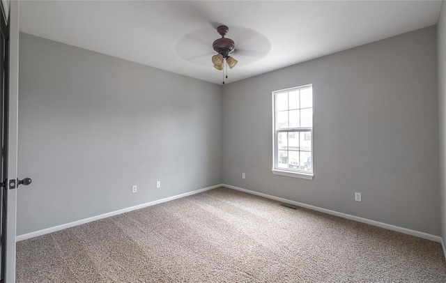 23529 Restore Rd, Waynesville, MO 65583 - unfurnished room featuring carpet floors, a ceiling fan, and baseboards