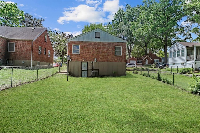back of house with brick siding