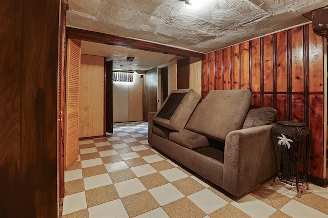 8909 Tutwiler Ave, Berkeley, MO 63134 - cinema featuring tile patterned floors and wood walls