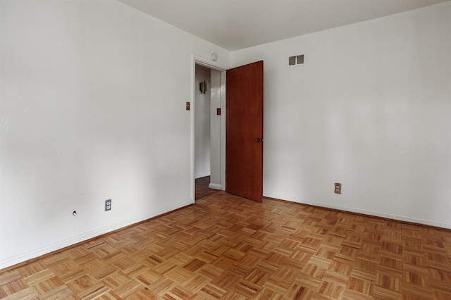 8909 Tutwiler Ave, Berkeley, MO 63134 - spare room featuring baseboards