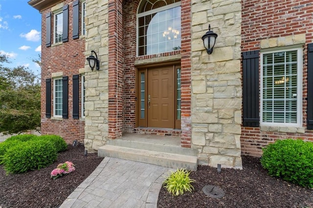 230 Merlot Ln, Saint Albans, MO 63073 - entrance to property featuring brick siding and stone siding