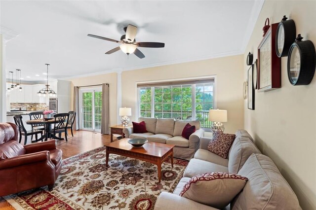 230 Merlot Ln, Saint Albans, MO 63073 - living room featuring ceiling fan, light wood-type flooring, and crown molding