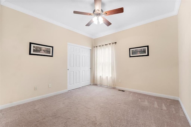 230 Merlot Ln, Saint Albans, MO 63073 - unfurnished bedroom featuring light carpet, ornamental molding, baseboards, and a closet