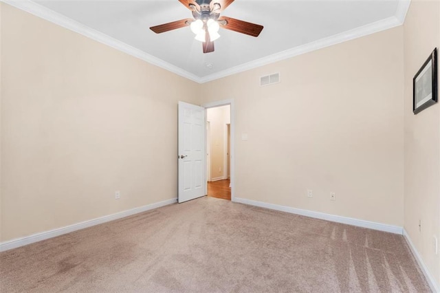 230 Merlot Ln, Saint Albans, MO 63073 - empty room with light carpet, ornamental molding, a ceiling fan, and baseboards
