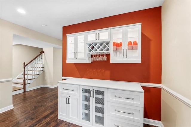230 Merlot Ln, Saint Albans, MO 63073 - indoor dry bar featuring stairway, dark wood finished floors, baseboards, and recessed lighting