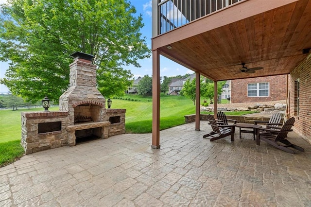 230 Merlot Ln, Saint Albans, MO 63073 - view of patio / terrace featuring an outdoor stone fireplace and a ceiling fan