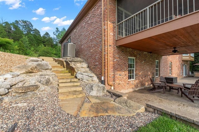 230 Merlot Ln, Saint Albans, MO 63073 - view of patio / terrace with ceiling fan and stairway