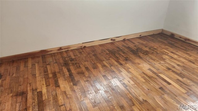 229 S Main St, Licking, MO 65542 - unfurnished room with wood-type flooring