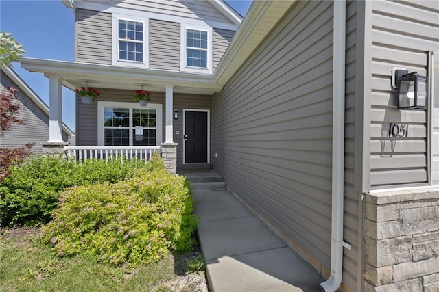 1051 Timber Creek Ln, Imperial, MO 63052 - view of exterior entry featuring covered porch