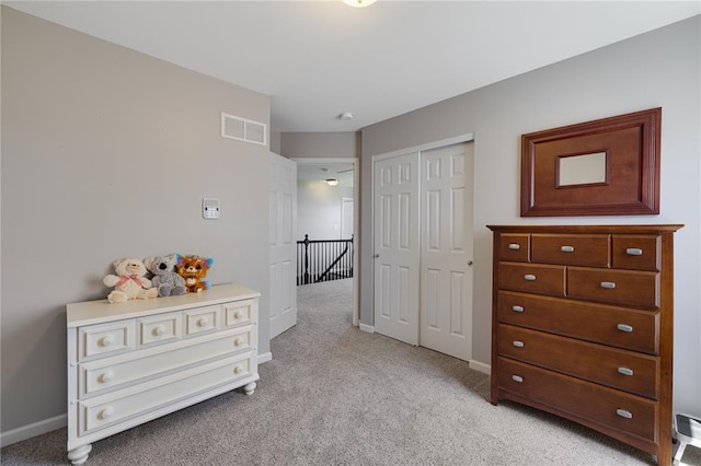 1051 Timber Creek Ln, Imperial, MO 63052 - bedroom featuring light carpet, a closet, and baseboards