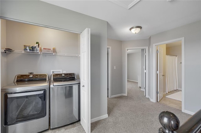 1051 Timber Creek Ln, Imperial, MO 63052 - laundry room with washer and dryer, baseboards, and light colored carpet